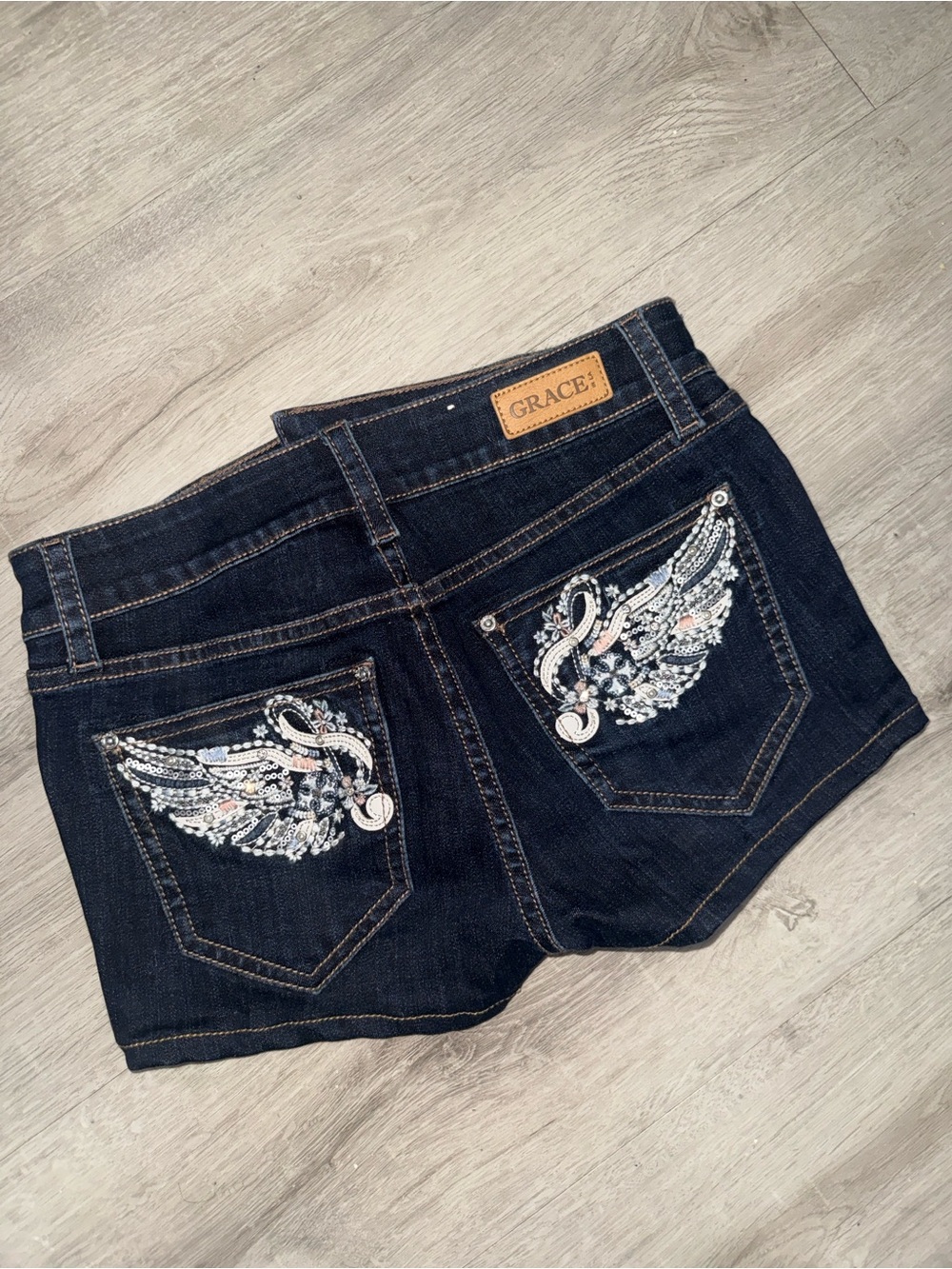 Grace in la micro Jean embellished shorts